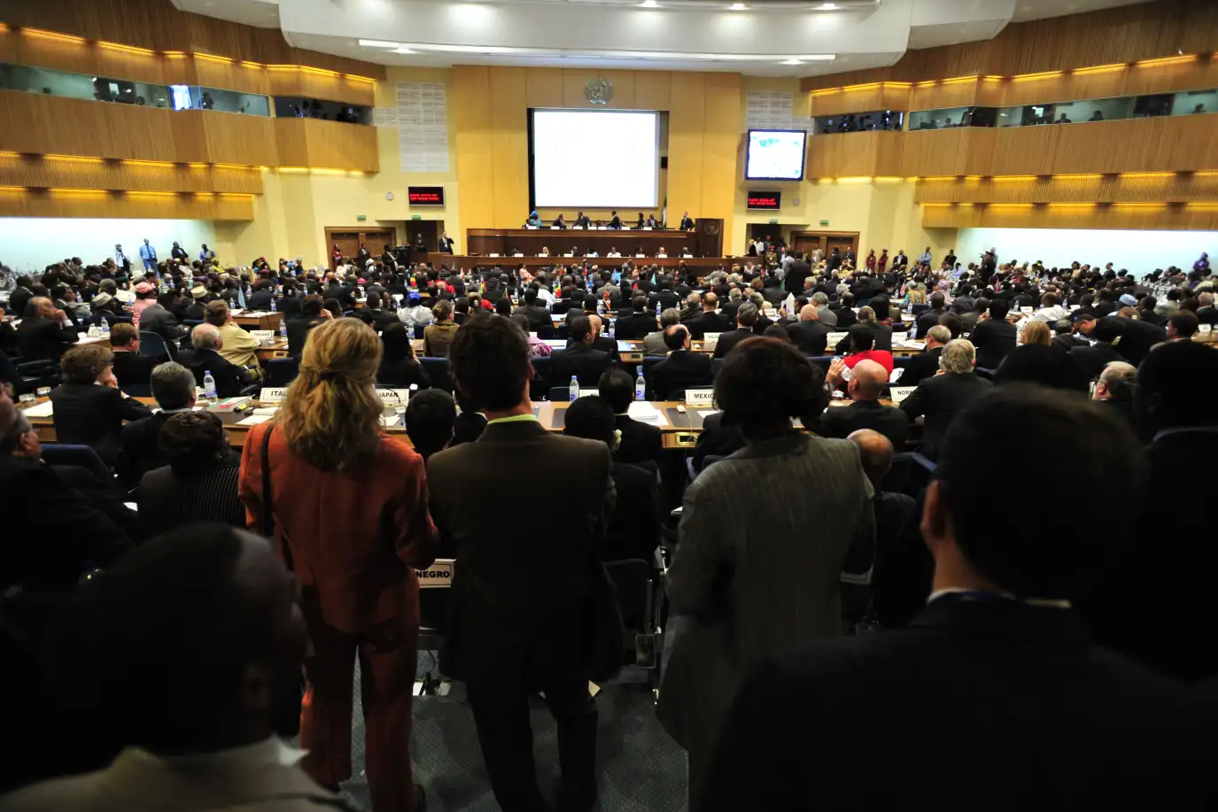 people interior crowd meeting