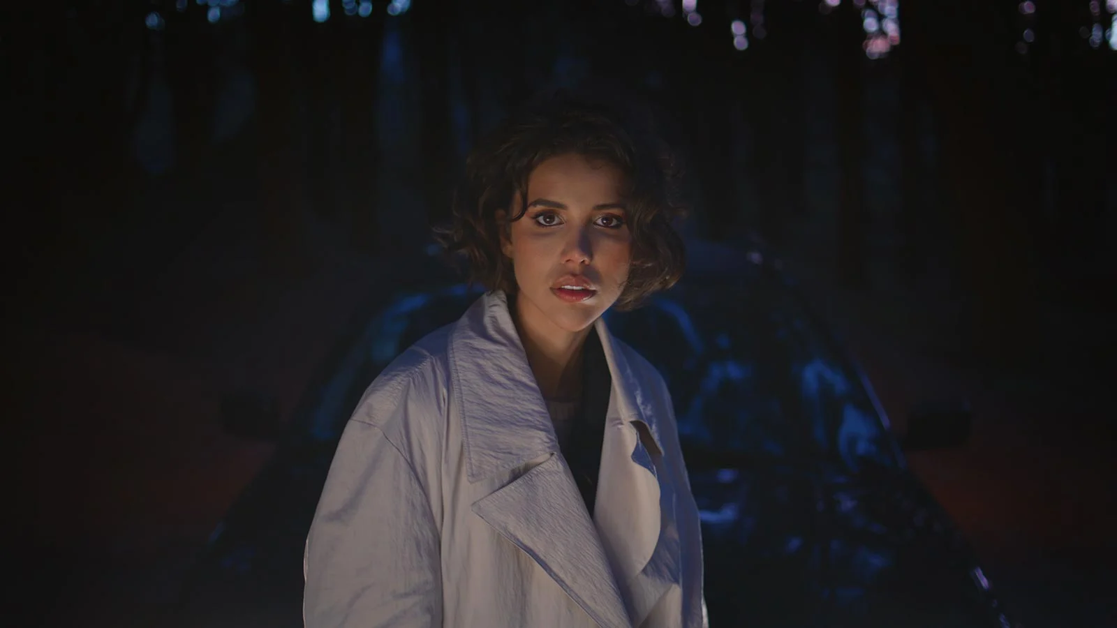 confident driver posing car