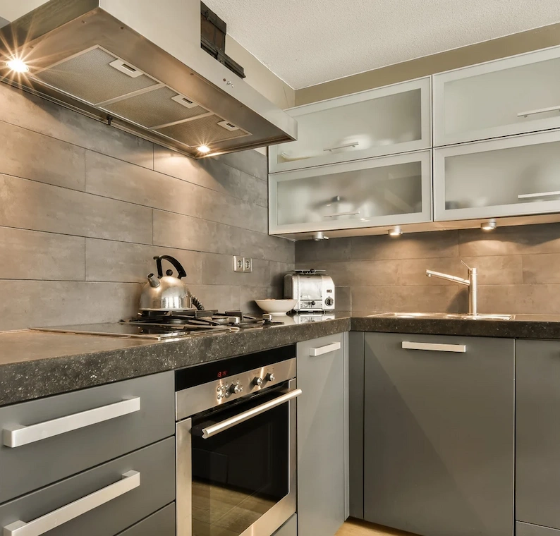 grid kitchen with gray cabinets