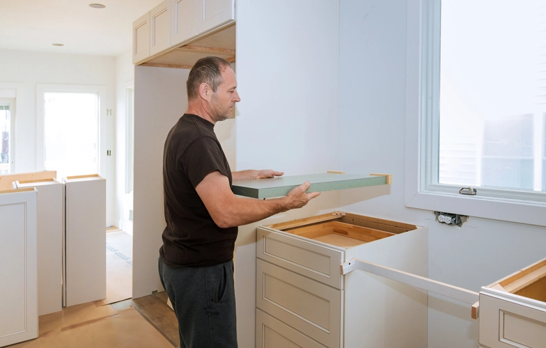kitchen remodel man and installing