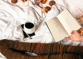 Coffee beside open book