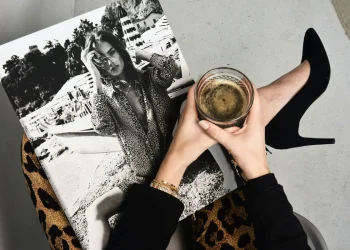 Coffee glass over magazine