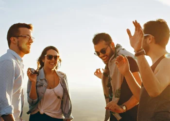 Friends enjoying beach walk