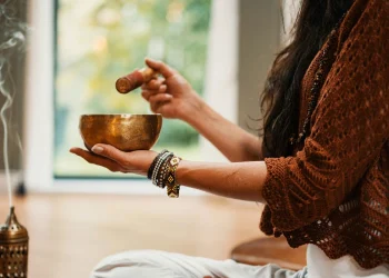 Hand holding tea cup