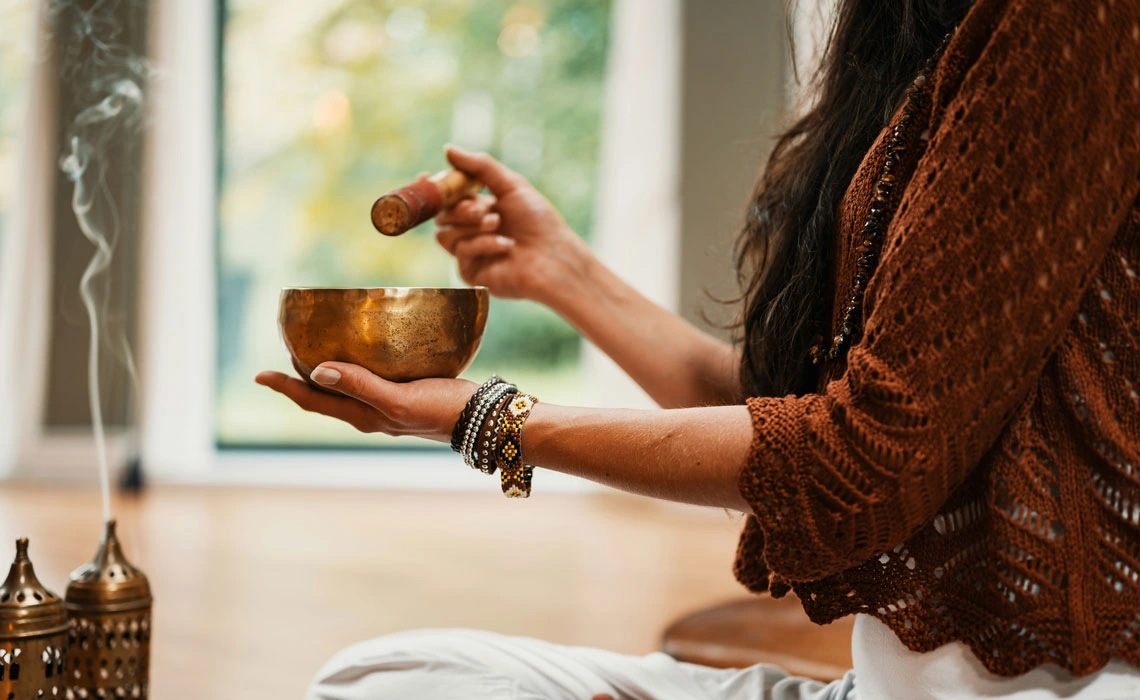 Hand holding tea cup