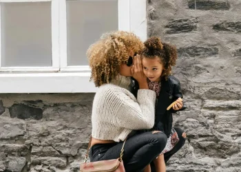 Mother hugging child