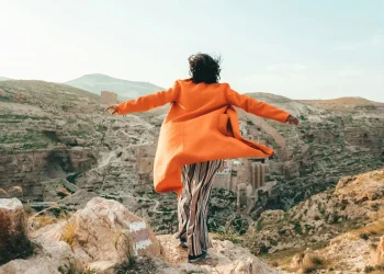 Person enjoying cliff view