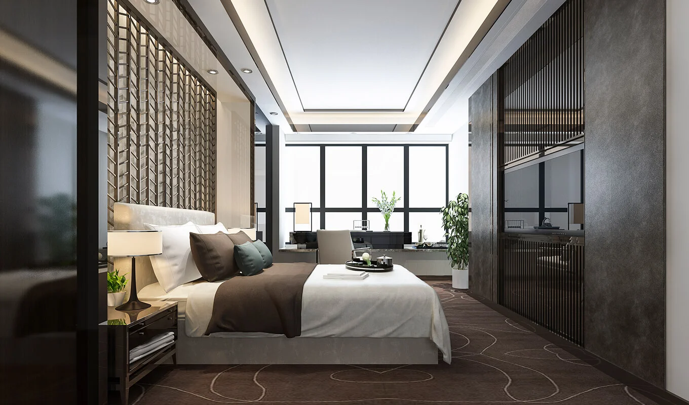 luxury bedroom suite in hotel with tv and working table