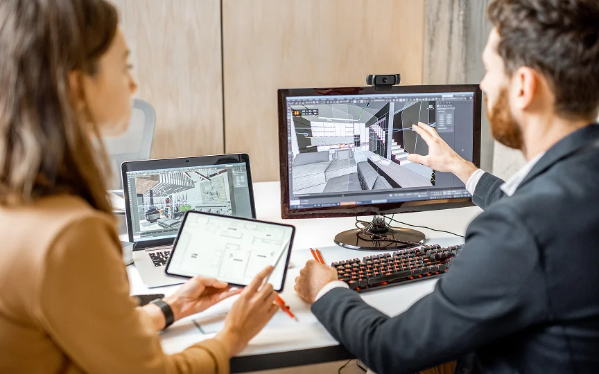 two interior designers working in the office together