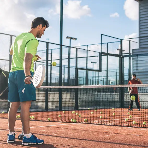 monitor teaching padel class
