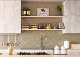 four gray bar stools in front of kitchen countertop