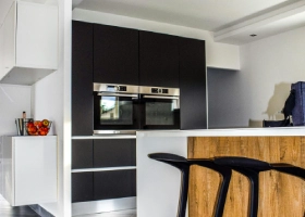 two black wooden bar stools