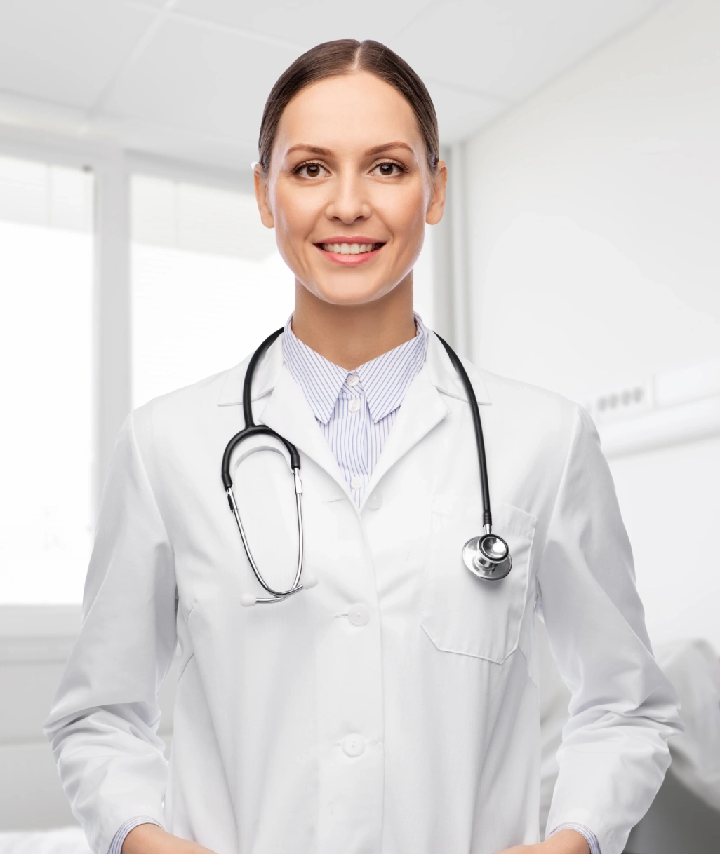 female doctor smiling with white coat