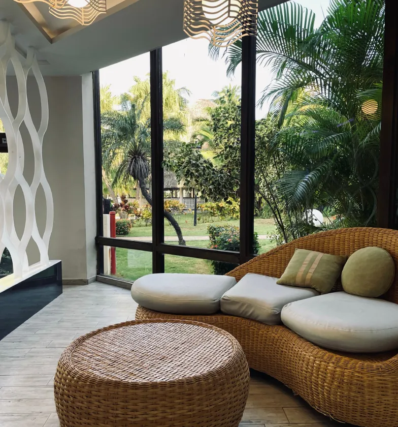 the living room features large wicker