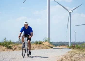 caucasian active sportsman riding bicycle