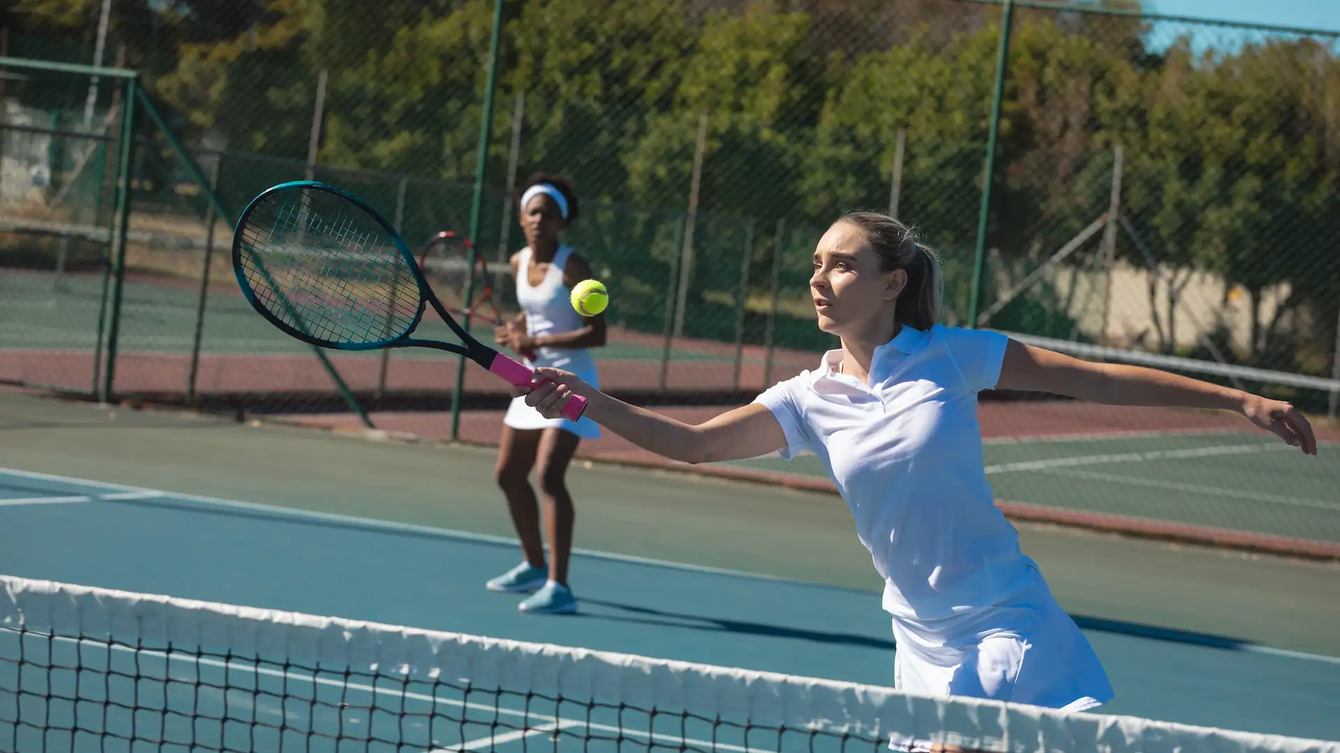 caucasian female athlete playing tennis