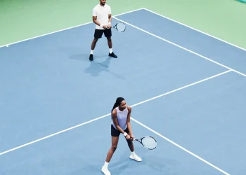 couple at tennis practice minimal