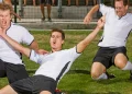 german soccer players celebrating win at game