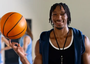 male african american basketball coach spinning