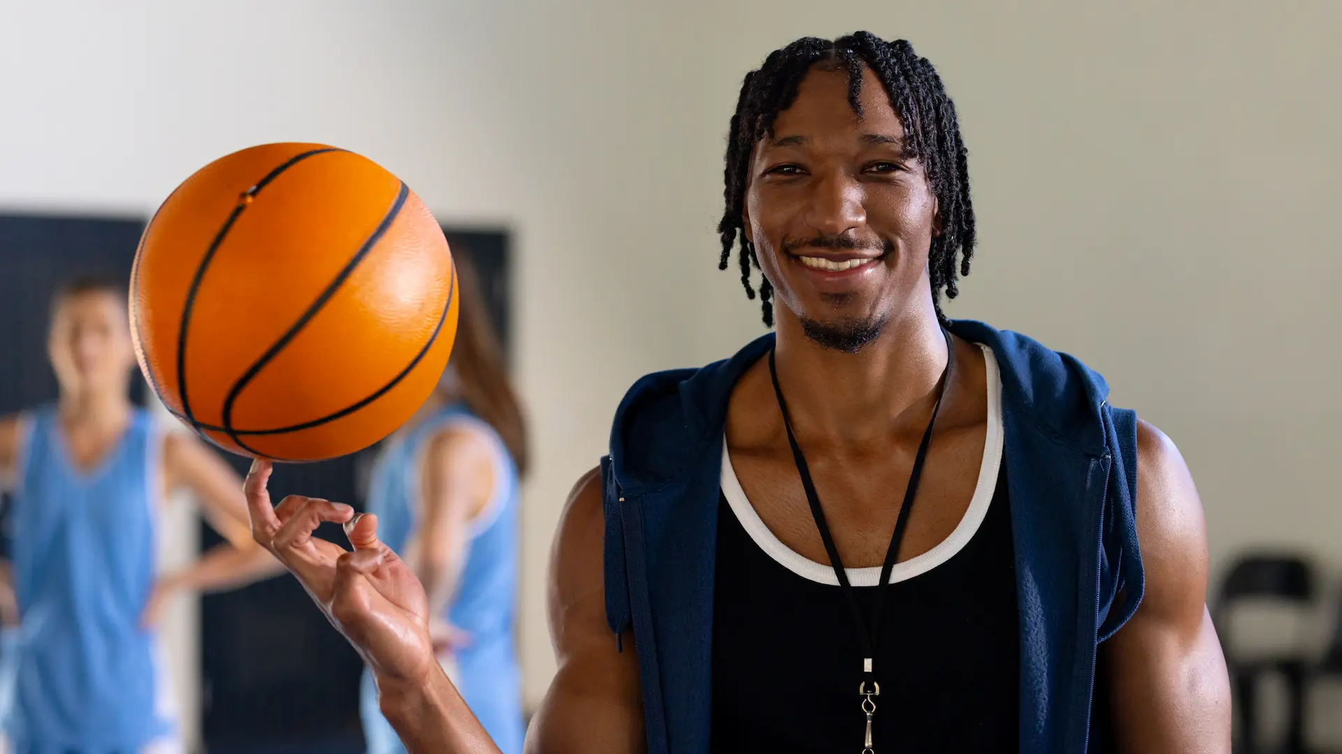 male african american basketball coach spinning