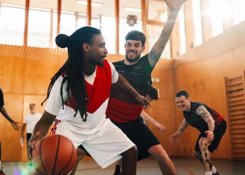 multicultural basketball players playing basketbal