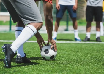 partial view of group of soccer players during