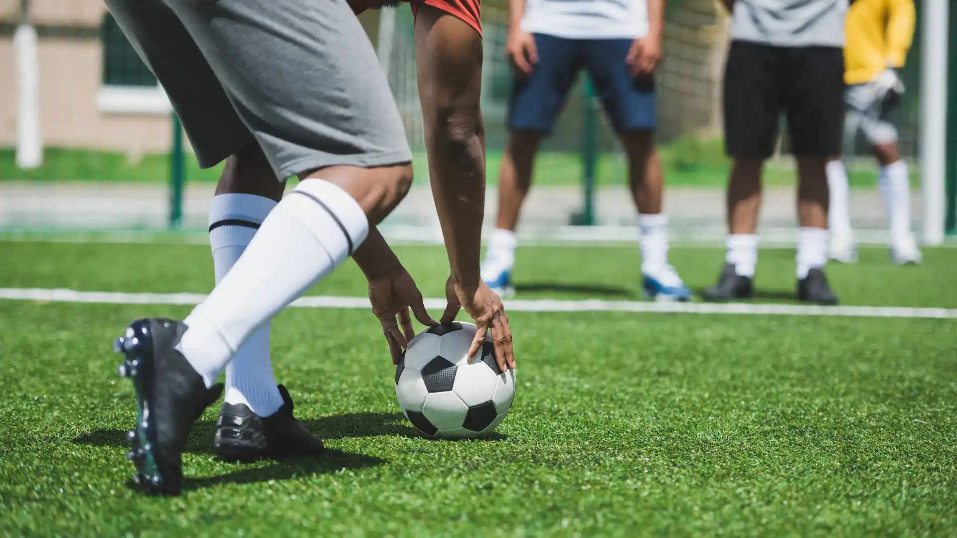 partial view of group of soccer players during