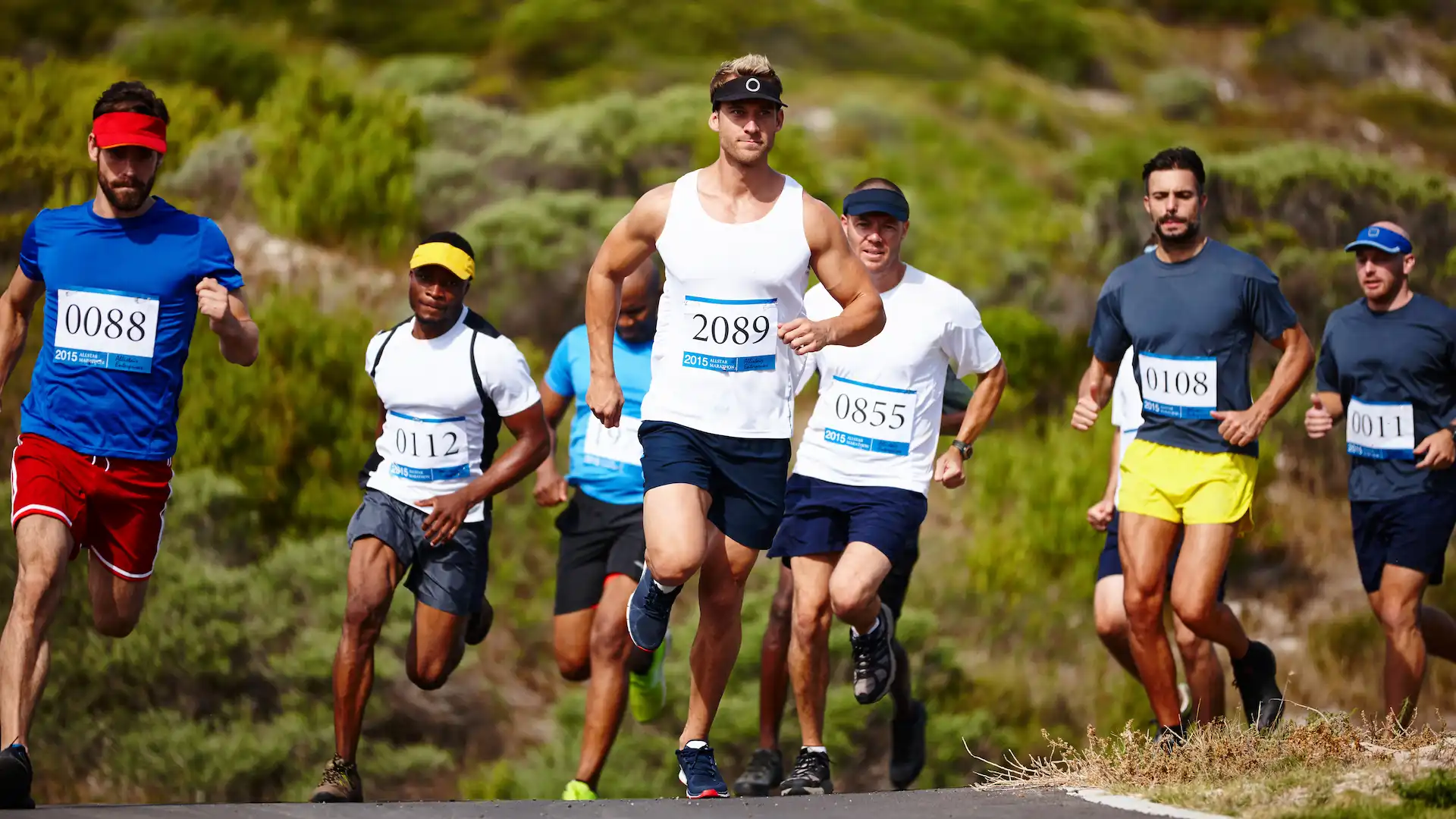 setting the pace shot of a group of young men run