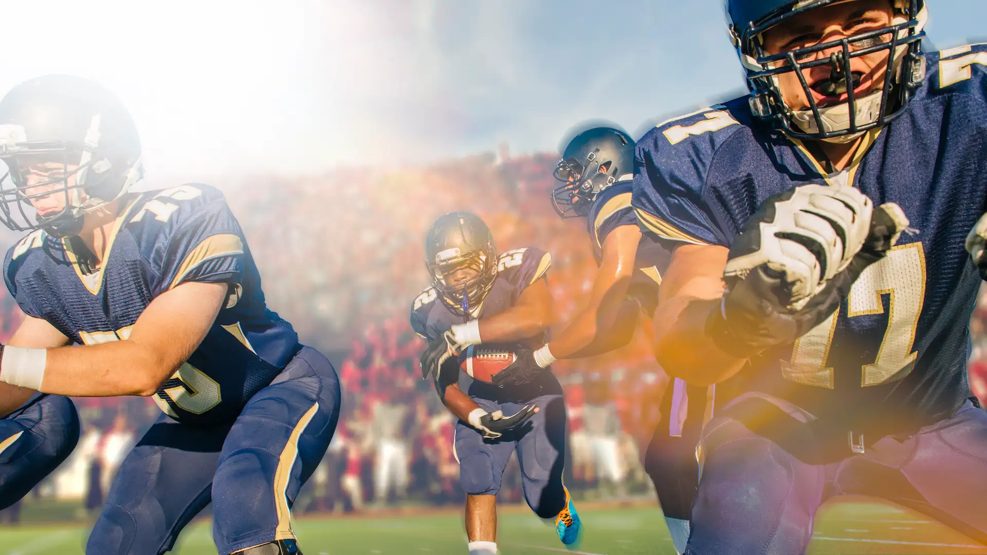 teenage and young male american football team play