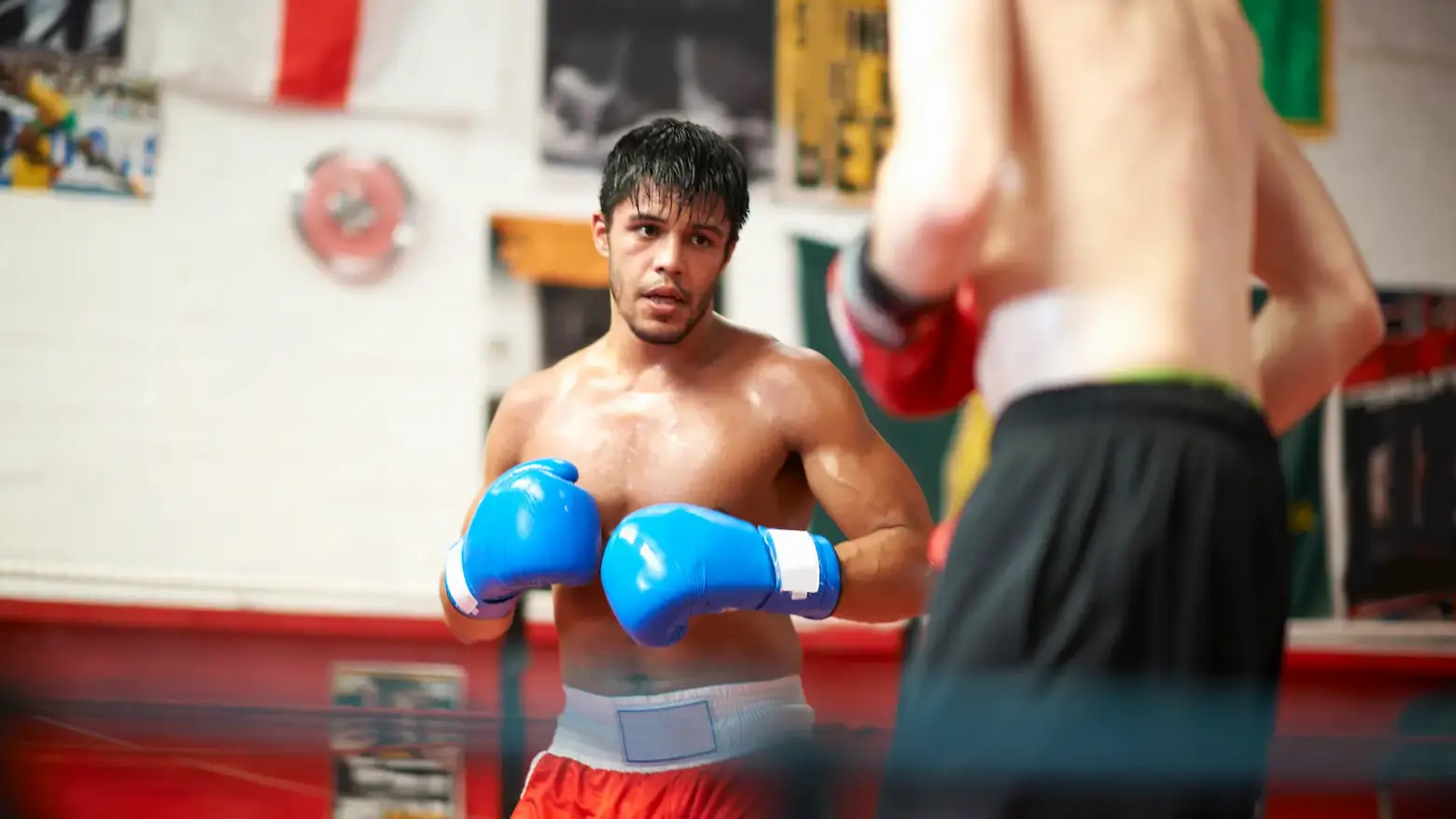 two boxers sparring in boxing stage