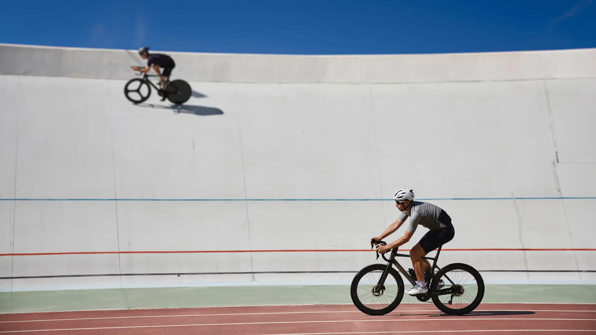 two healthy man cyclists exercising on bicycles
