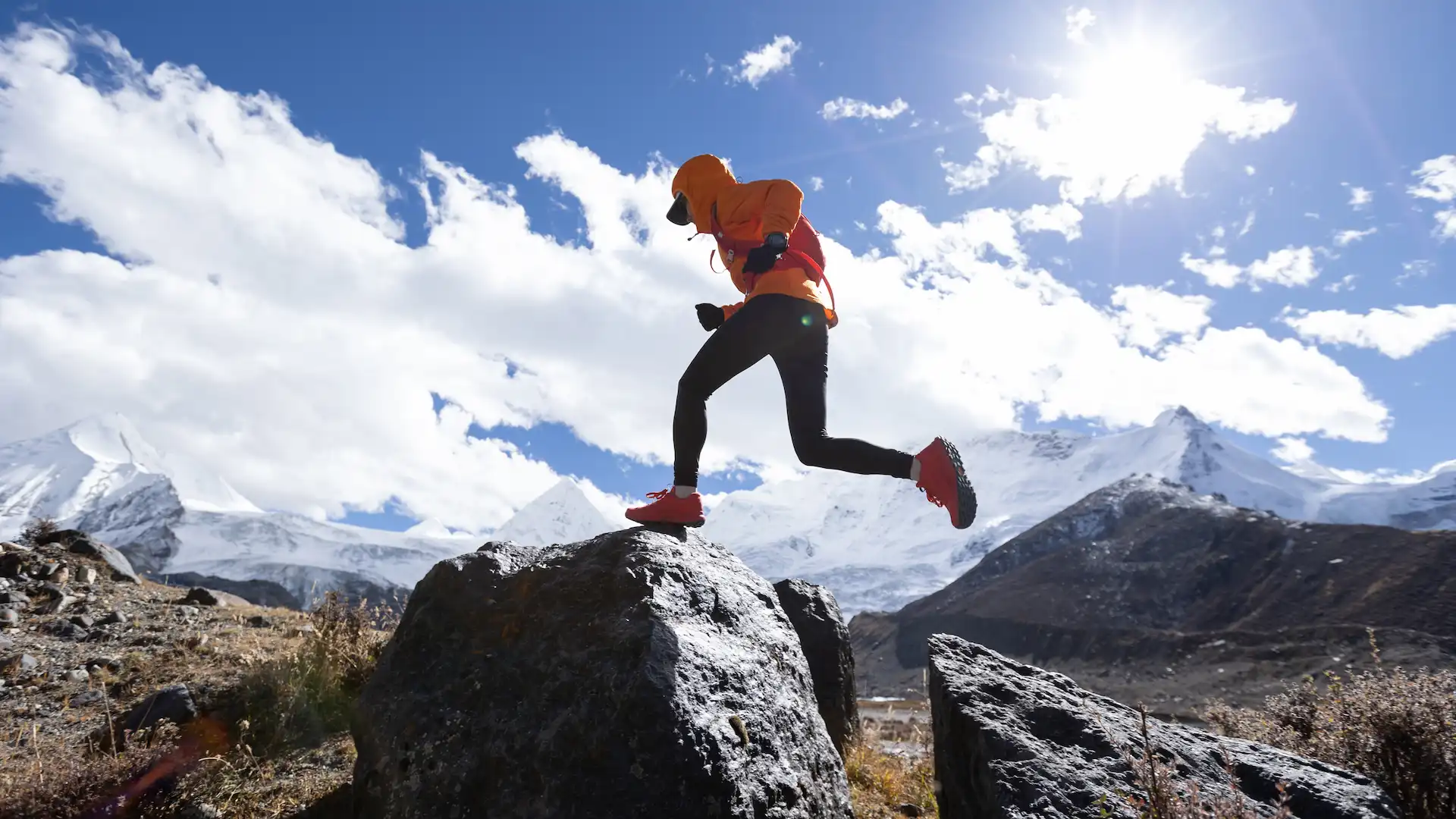 woman trail runner cross country running in high