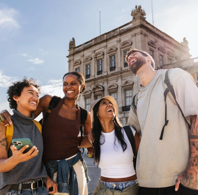 Group of happy tourists together in lisbon
